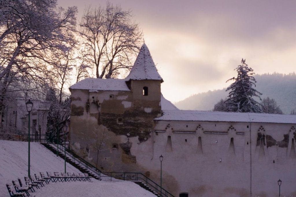 Weaver's Bastion, during twilight under a blanket of snow, in Brasov, Transylvania, Romania