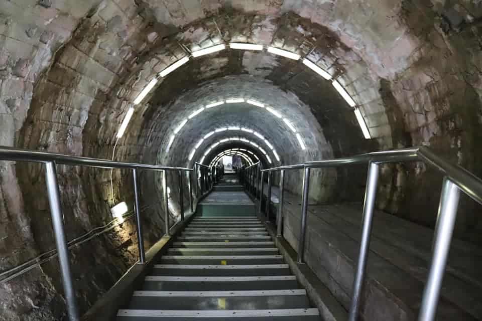 Long entrance taking visitors to the depths of Turda Salt Mine.