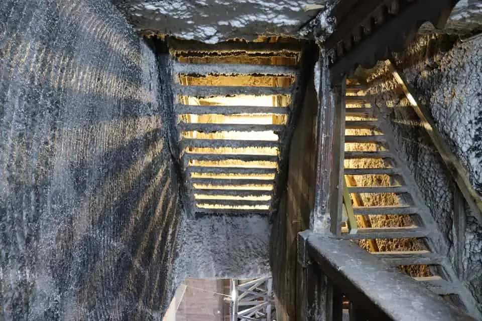Eerie winding stairs at Turda Salt Mine.