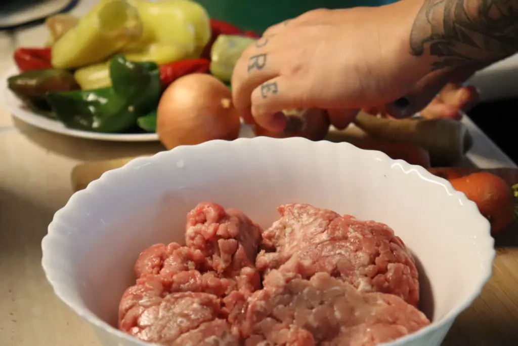 ground meat in bowl for stuffed pepper soup