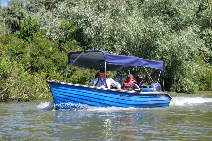 Blue boat on the Danube River in Romania