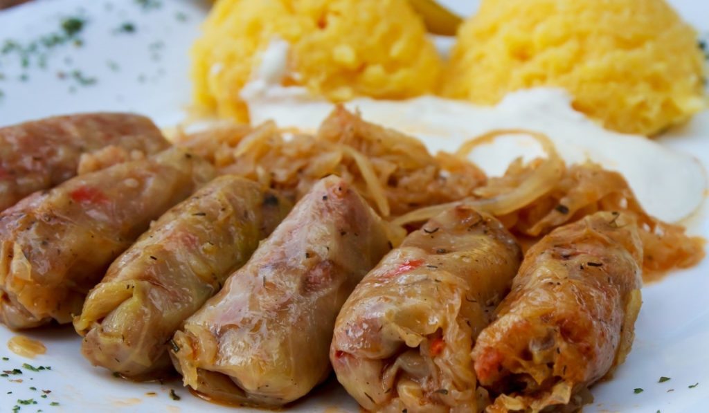 Plate of sarmale, stuffed cabbage rolls, at a restaurant in Brasov, Romania.