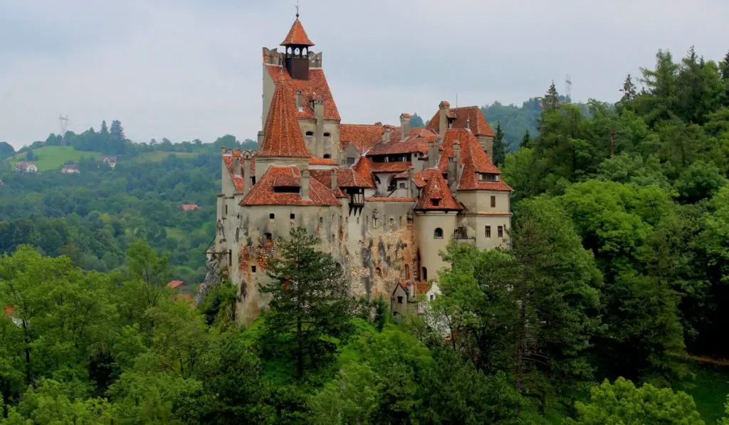 Dracula's Castle in Transylvania (Bran Castle) in the forest.