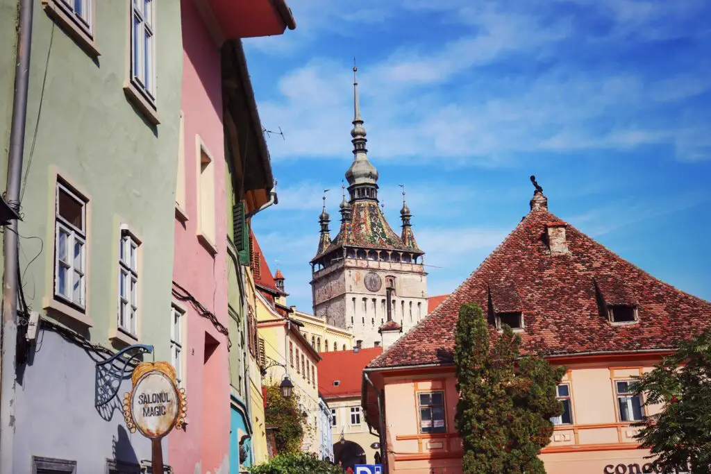 Colorful buildings and iconic clocktower in Sighisoara, Romania