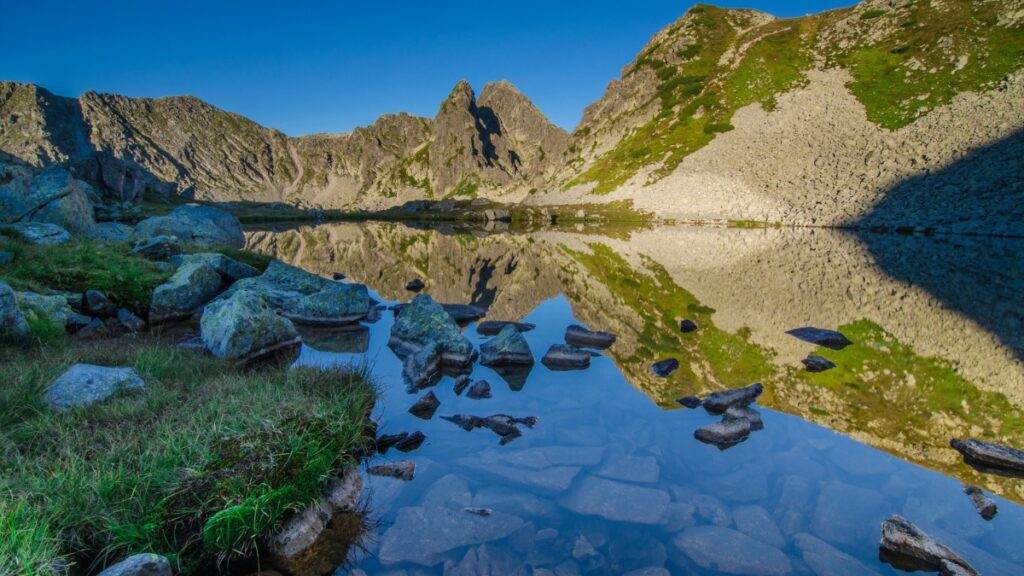 Beautiful shallow lake in Retezat mountains
