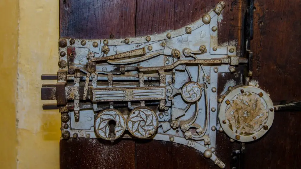 Intricate locking mechanism on the door at Biertan fortified church in Romania.